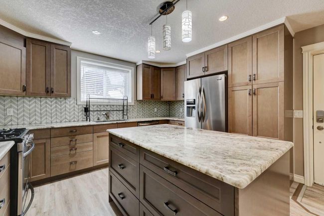 234 Canoe Square Sw, Home with 6 bedrooms, 4 bathrooms and 6 parking in Airdrie AB | Image 30