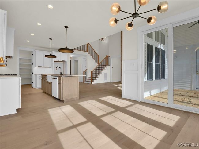 Photo represents the plan, not the actual home. Design selections may vary. The adjoining dining area is perfect for family meals or entertaining guests. | Image 6