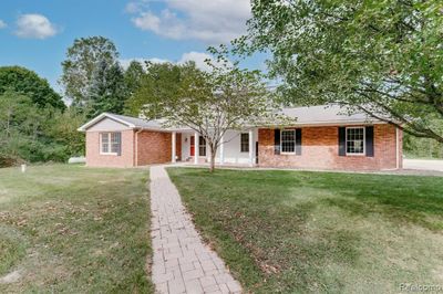 4216 Meadow Pond Lane, Home with 4 bedrooms, 2 bathrooms and null parking in Hadley Twp MI | Image 3