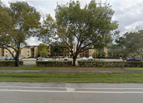 s305-2041 Coral Ridge Dr, Coral Springs, FL, 33071-7834 | Card Image