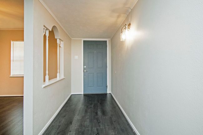 Hall with hardwood / wood-style flooring | Image 7