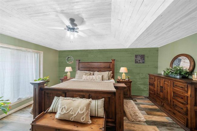 This digitally altered image showcases multiple design possibilities for a single space. The photo has been enhanced to illustrate variations in wall colors and lighting styles. Allowing viewers to visualize how the same room can be transformed through different design choices. | Image 25