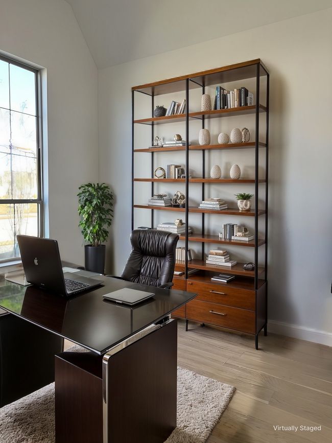 Office area with vaulted ceiling, light wood-type flooring, and baseboards | Image 4