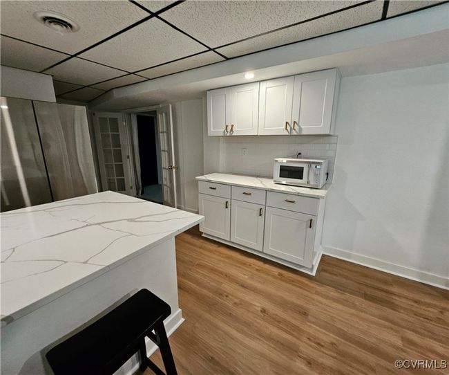 Kitchenette view into Seating area of Great Room | Image 47