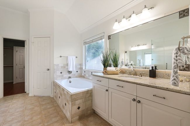 Bright, clean, and spacious—every bathroom adds to the home’s appeal. | Image 19