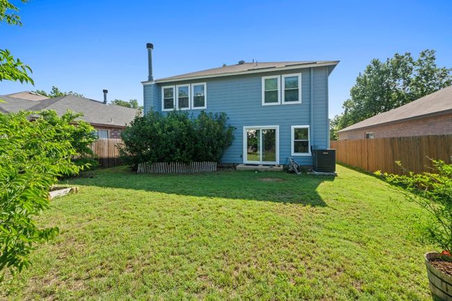Rear view of house with central AC | Image 32