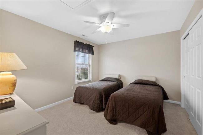 The third bedroom on the 2nd level is an ideal guest room with large sliding closet. | Image 31