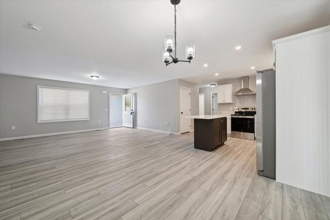 Dining Area view of Living and Kitchen | Image 12