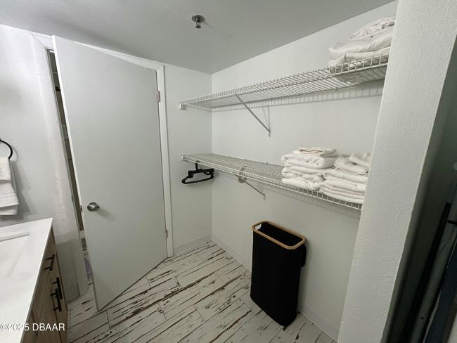 213-1909 S Atlantic shelving behind door | Image 24