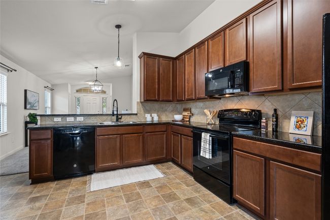 Lovely wood cabinetry | Image 13