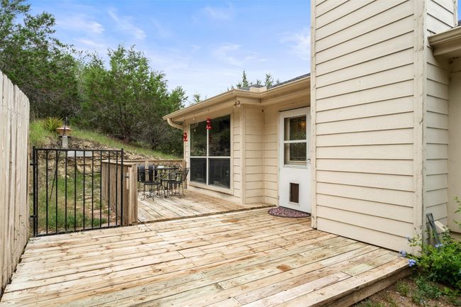 Wooden terrace with outdoor dining area | Image 39