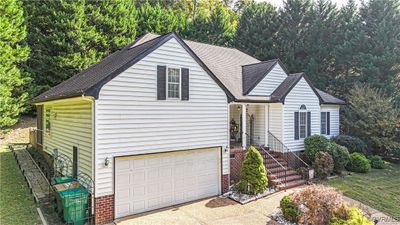 View of front facade featuring a garage | Image 3