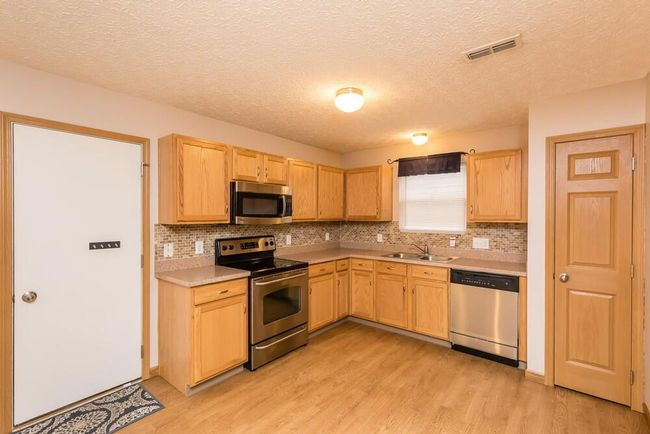 5975 Pennington Creek Dr, Condo with 3 bedrooms, 3 bathrooms and null parking in Dublin OH | Image 17