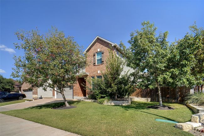 View of swimming pool featuring a sunroom and a yard | Image 26