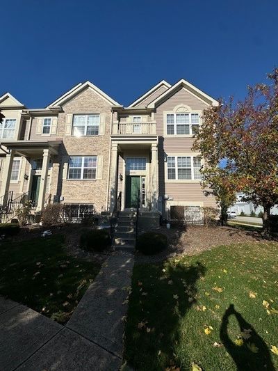 24401 John Adams Drive, Townhouse with 3 bedrooms, 2 bathrooms and 2 parking in Plainfield IL | Image 1