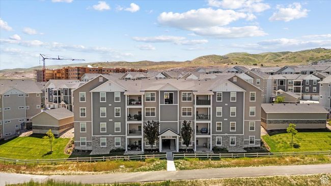 View of building exterior with a residential view and a mountain view | Image 23