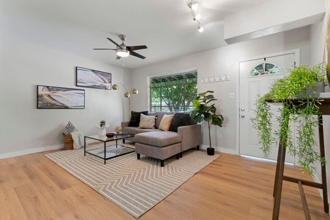 This angle showcases the functional layout and high ceilings throughout the home. | Image 4
