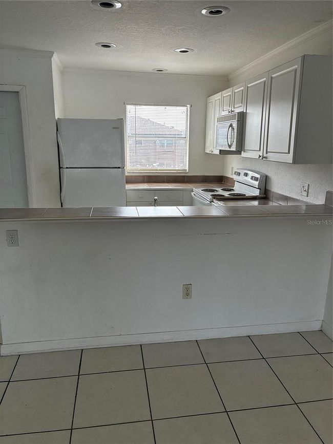 B3 - 25050 Sandhill Blvd, Condo with 2 bedrooms, 2 bathrooms and null parking in Port Charlotte FL | Image 6