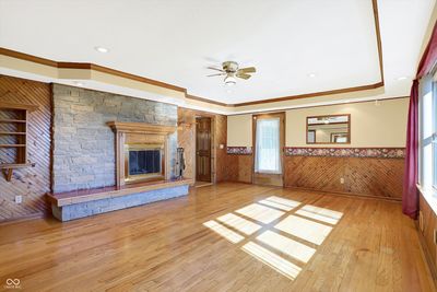 Generous sized living room with fireplace. | Image 3