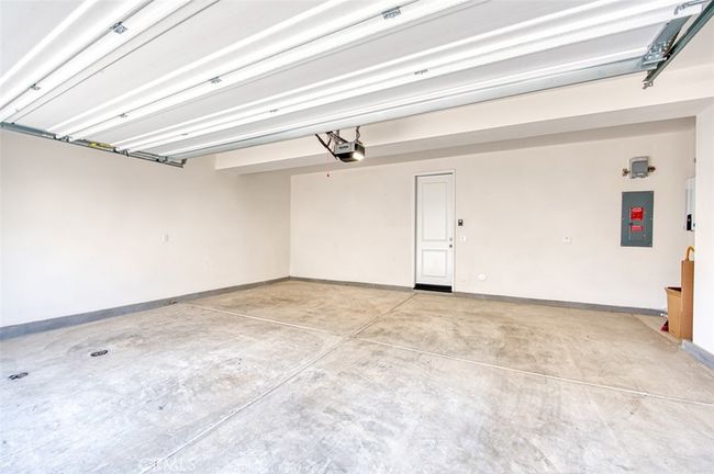 Spacious attached, direct access 2-car garage. | Image 27