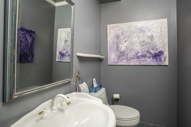Half bath featuring toilet and a sink | Image 14