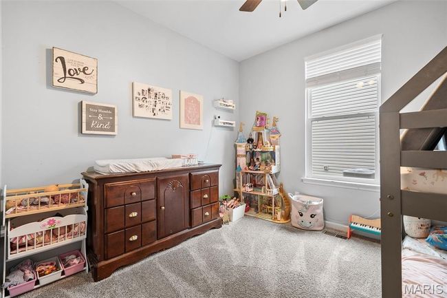 Bedroom featuring carpet and ceiling fan | Image 23