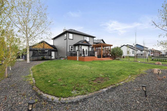 716 Boulder Creek Drive Se, House other with 4 bedrooms, 4 bathrooms and 4 parking in Langdon AB | Image 39