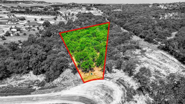 Aerial perspective of suburban area featuring property parcel outlined | Image 5