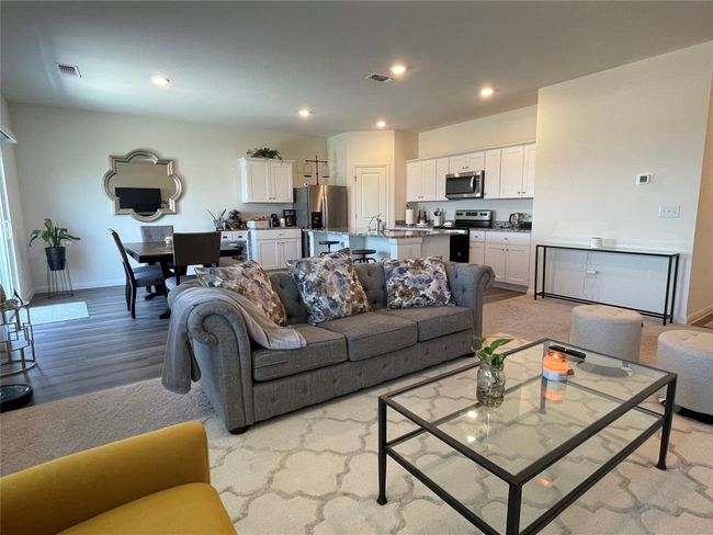 Large windows let the natural light stream in. | Image 9