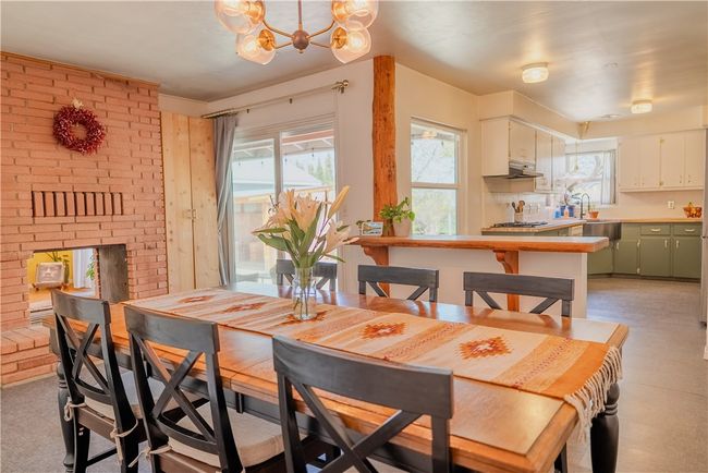 Dining space facing Kitchen and sliding door to backyard | Image 10