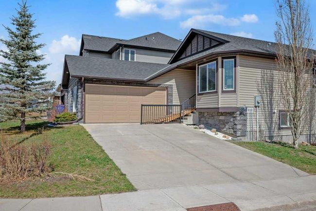 100 Rainbow Falls Row, Home with 4 bedrooms, 2 bathrooms and 4 parking in Chestermere AB | Image 1