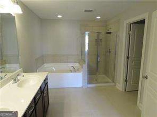 8265 Village Pl, Townhouse with 3 bedrooms, 3 bathrooms and 2 parking in Suwanee GA | Image 19