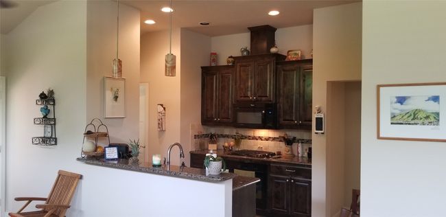 Kitchen open to living dining | Image 6