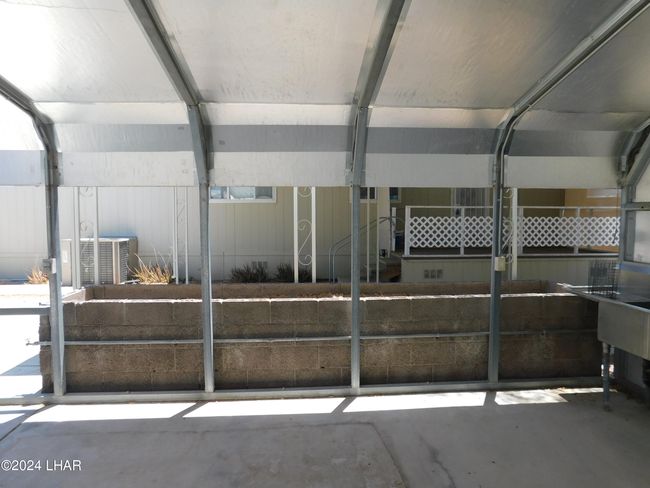 Awning and carport between buildings | Image 46