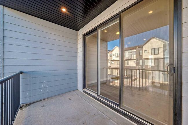 207 Evanscrest Square Nw, Townhouse with 2 bedrooms, 3 bathrooms and 1 parking in Calgary AB | Image 14
