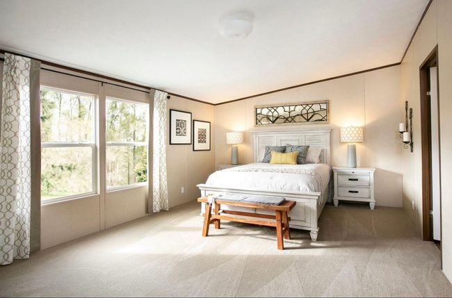 Bedroom featuring ornamental molding, and vaulted ceiling | Image 8