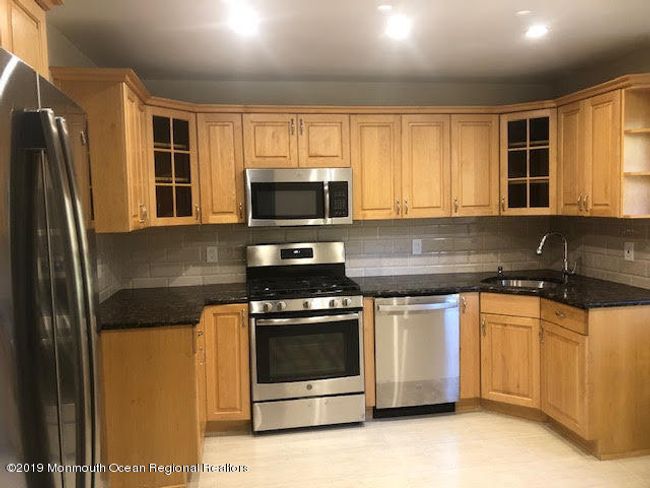 46 Dortmunder Dr, Townhouse with 4 bedrooms, 3 bathrooms and null parking in Manalapan NJ | Image 12