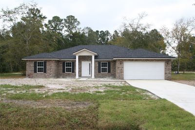 54528 Church Road, Home with 4 bedrooms, 2 bathrooms and null parking in Callahan FL | Image 1