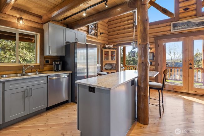 Electrical within the island, overhead lighting and great counter space for all your culinary adventures. | Image 19