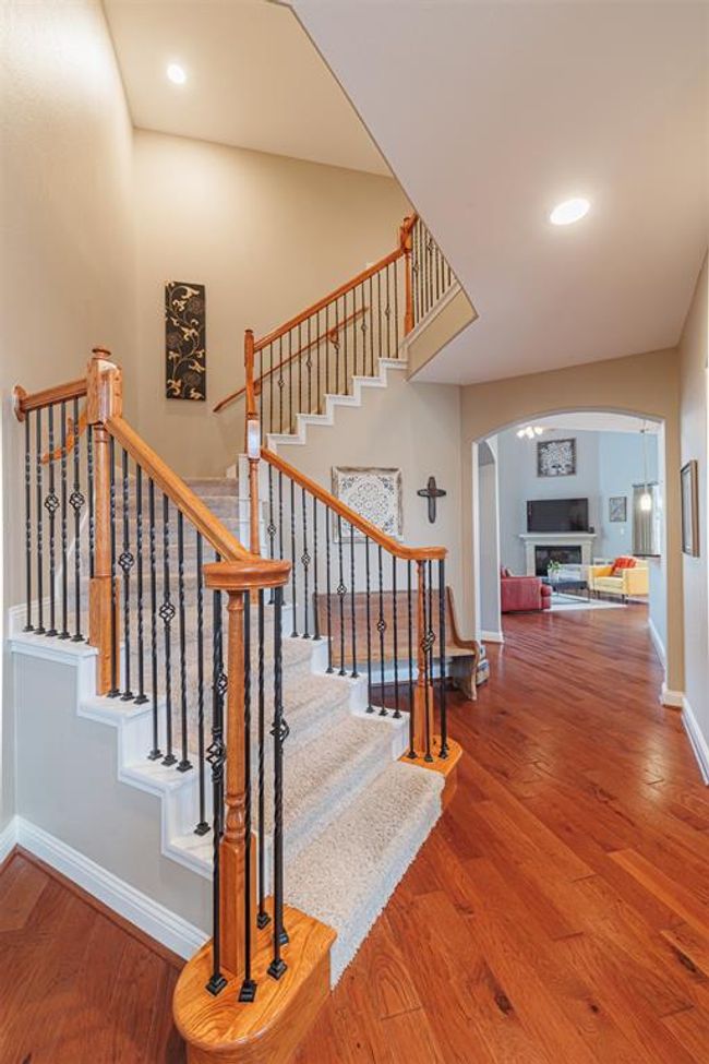 Staircase with wrought iron spindles. | Image 7