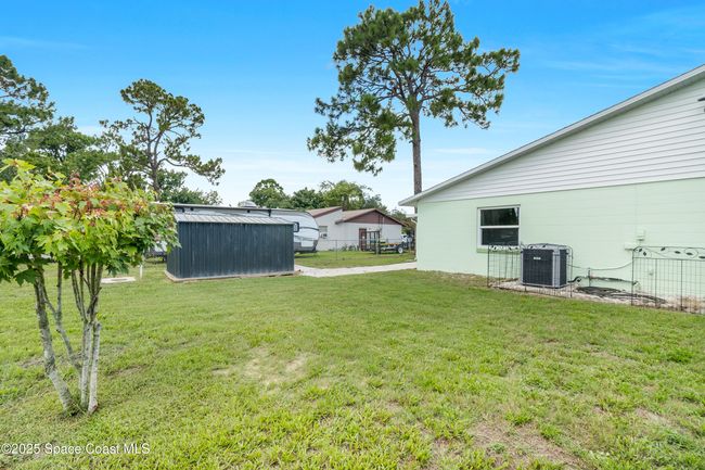 6450 Ember Ave, House other with 4 bedrooms, 2 bathrooms and null parking in Cocoa FL | Image 5