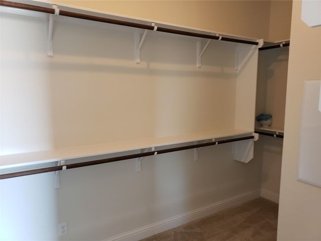 View of walk in closet | Image 15