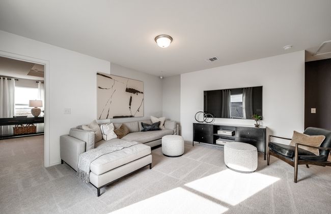 Gathering room drenched in natural light, creating a warm atmosphere *Model representation | Image 6