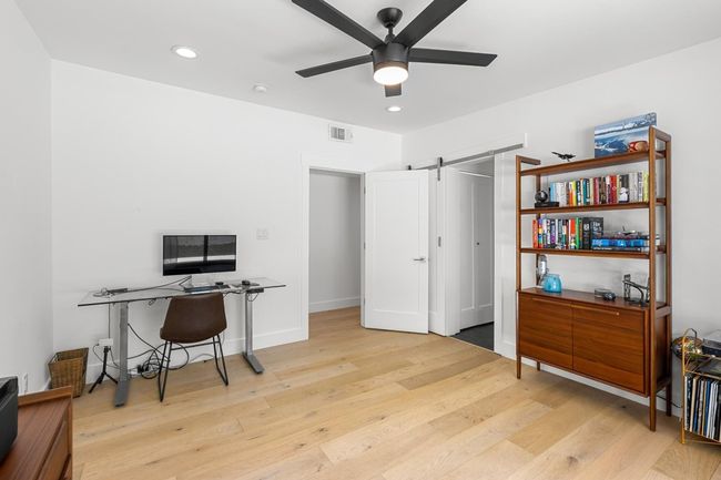 Office with a ceiling fan, visible vents, recessed lighting, wood finished floors, and baseboards | Image 20