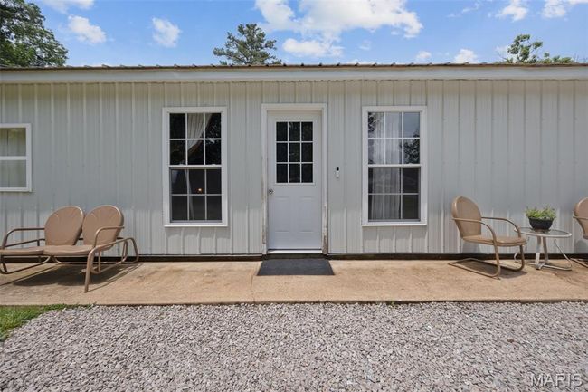 Doorway to property with a patio area | Image 27