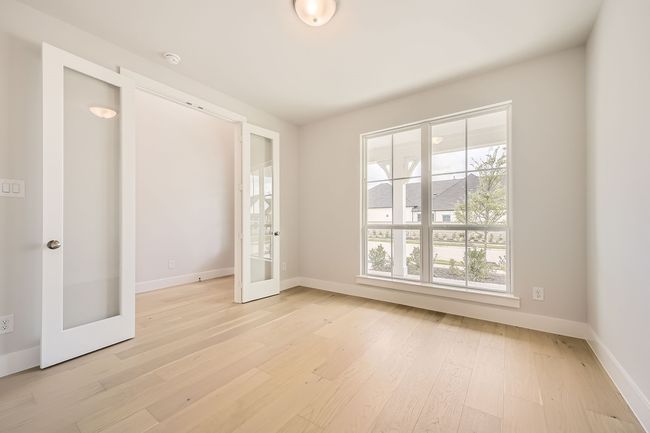 Spare room with french doors and light wood-style flooring | Image 14