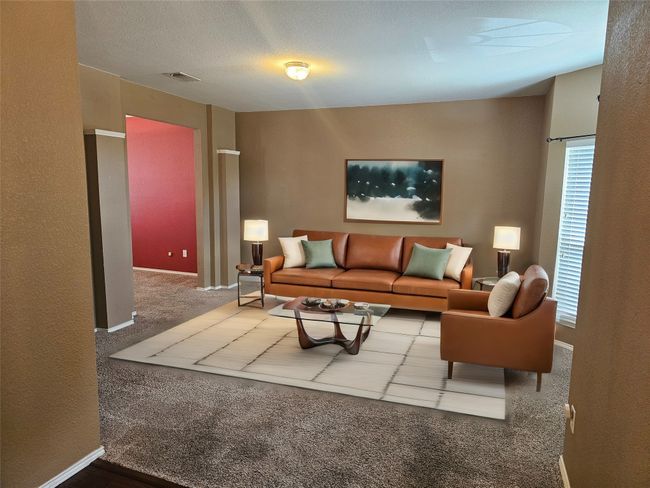 Living room featuring carpet floors and baseboards | Image 5