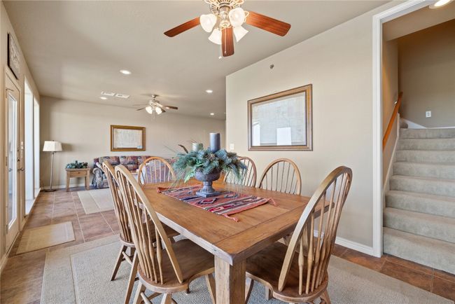 Dining space featuring stairs, baseboards, visible vents, and recessed lighting | Image 13