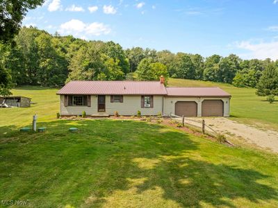 10003 Malibu Road Ne, House other with 3 bedrooms, 1 bathrooms and null parking in Minerva OH | Image 1