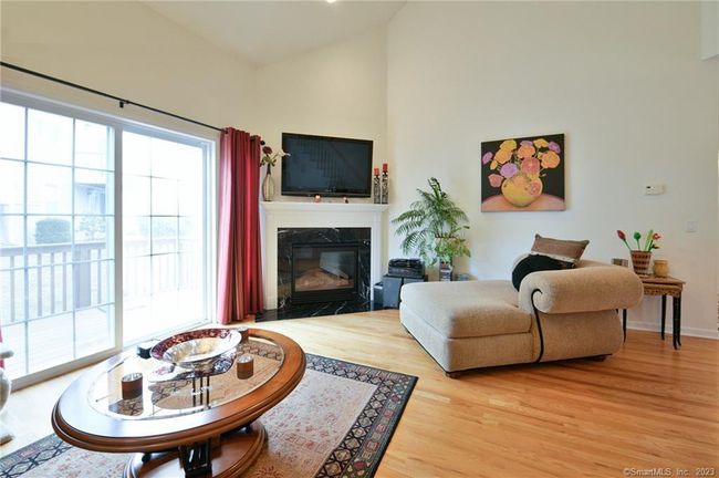 Step out onto your deck or stay in and enjoy the direct vent gas fireplace. | Image 10